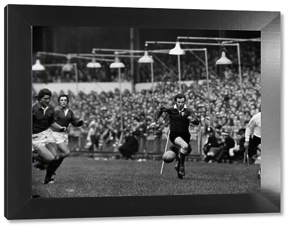 JJ Williams chases a kick ahead during the 1974 Five Nations