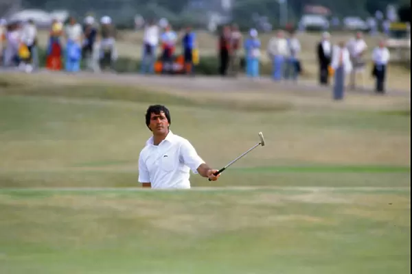 Seve Ballesteros watches his putt from off the green
