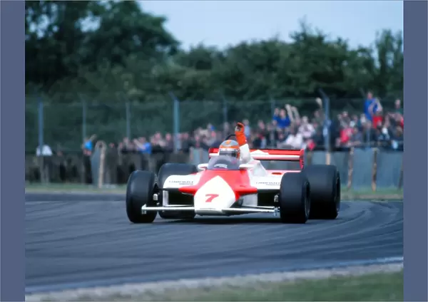 John Watson waves to the crowd after Silverstone victory 1981
