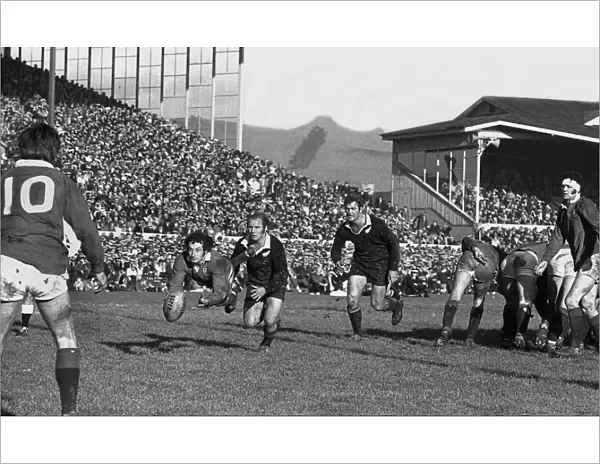Gareth Edwards passes to Barry John during the second Lions test against the All Blacks in 1971