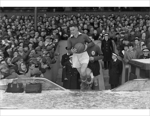 Billy Liddell leads out Liverpool in the 1956 FA Cup