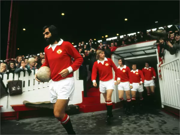 George Best leads out Manchester United in 1973