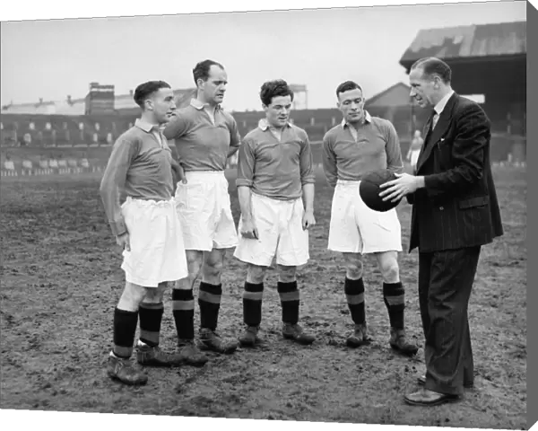 Matt Busby with four of his Manchester United players - 1946  /  7