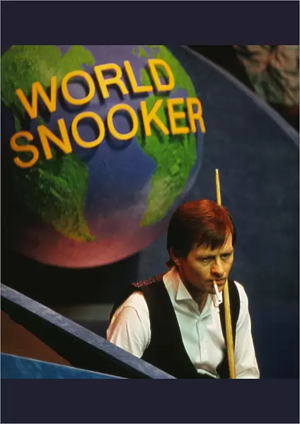 Alex Higgins has a cigarette at the 1987 Embassy World Snooker Championship