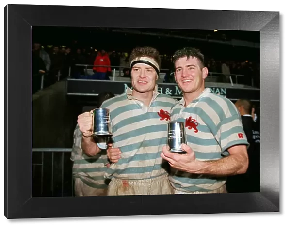 The Innes Brothers celebrate victory in the 1998 Varsity Match