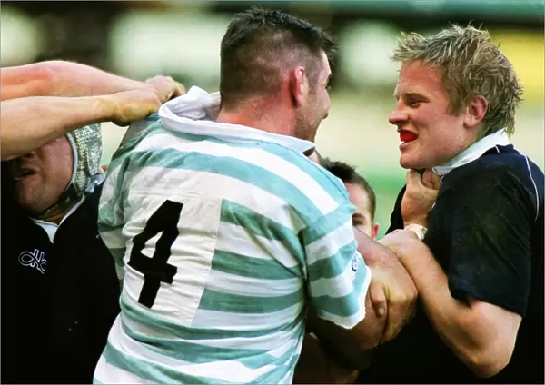 Angus Innes squares-up with Simon Miall - 2001 Varsity Match