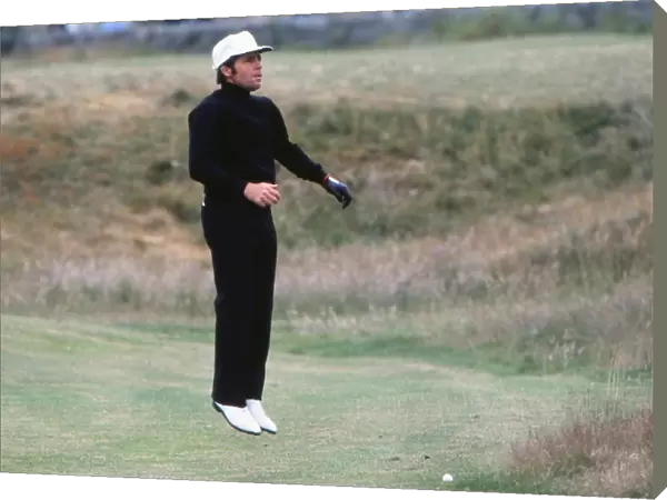 Gary Player jumps to get a better view of the green at St Andrews