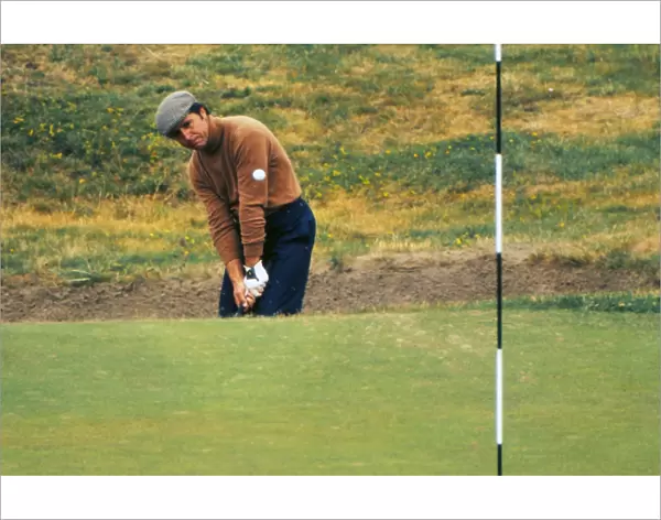 Gary Player chips to the green during the 1974 Open
