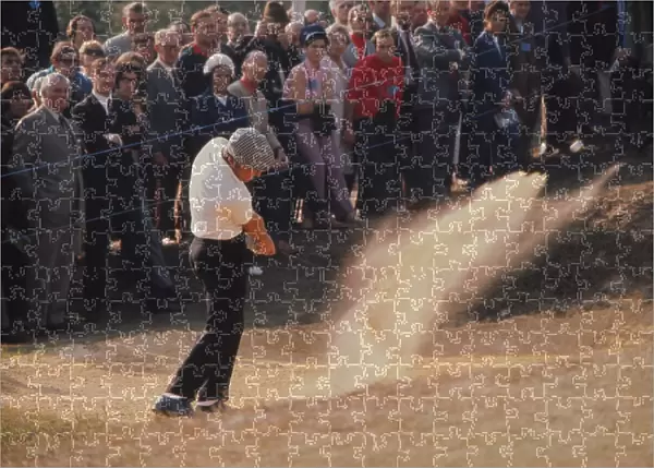 Gary Player hits out of a bunker on the way to victory at the 1974 Open