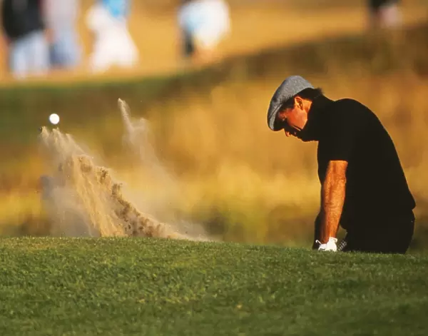Gary Player escapes from the sand in 1988