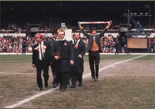 Sunderland carry their Leeds died 1973 coffin to the Roker Park centre-circle