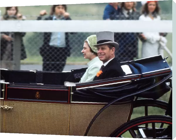 The Queen and Prince Phillip arrive at the races in the Royal Carriage, 1973