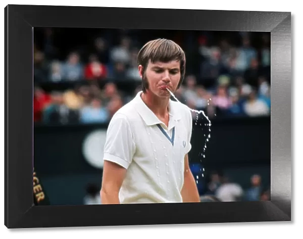 Jimmy Connors spits water in 1972