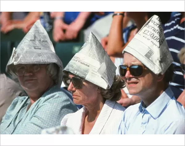 Newspaper sun hats in the Wimbledon crowd
