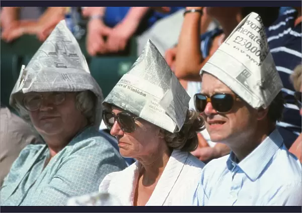 Newspaper sun hats in the Wimbledon crowd