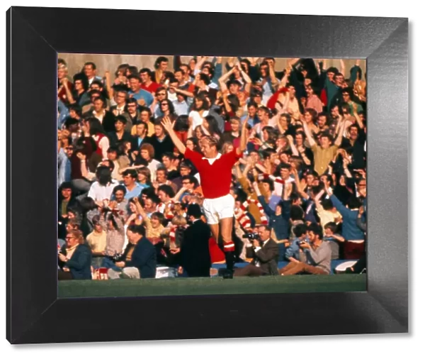 Bobby Charlton celebrates his sides goal in his last home game for Manchester United