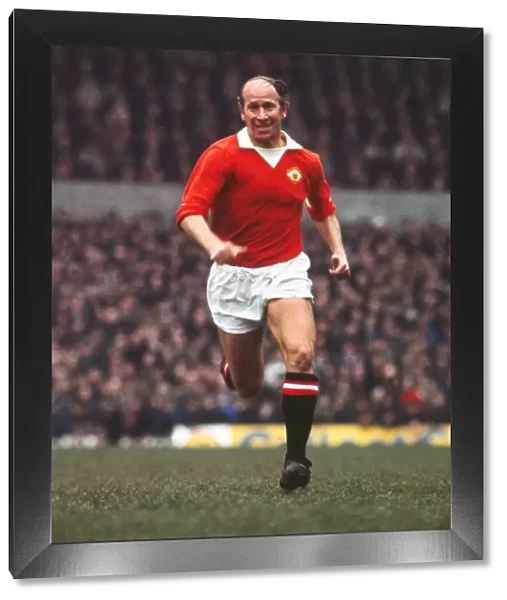 Bobby Charlton playing in his last home game for Manchester United