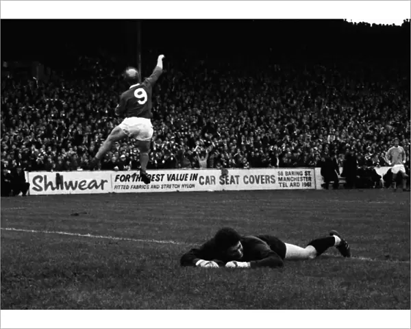 Bobby Charlton celebrates scoring against Manchester City in 1967