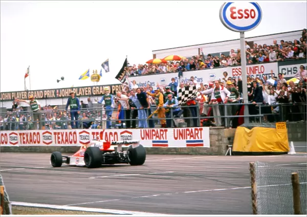 James Hunt crosses the line to win the 1976 British Grand Prix