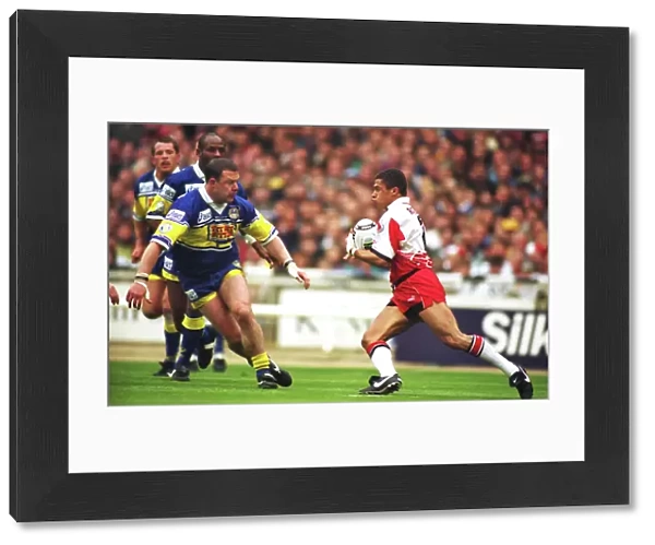 Wigans Jason Robinson takes on Leeds Garry Schofield in the 1995 Challenge Cup Final