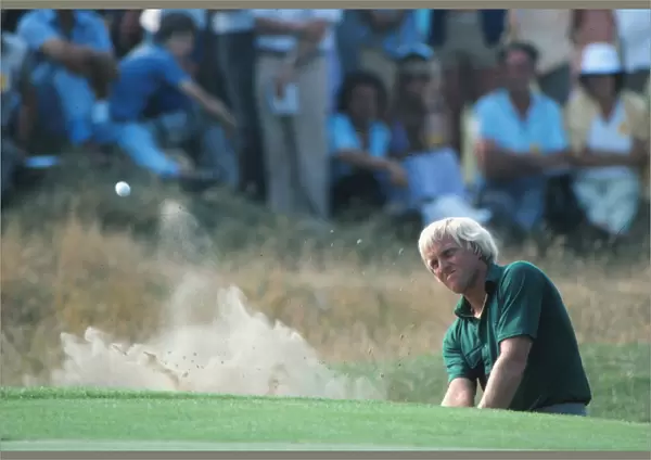 Greg Norman plays a bunker shot during the 1983 Open Championship