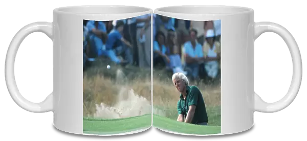 Greg Norman plays a bunker shot during the 1983 Open Championship