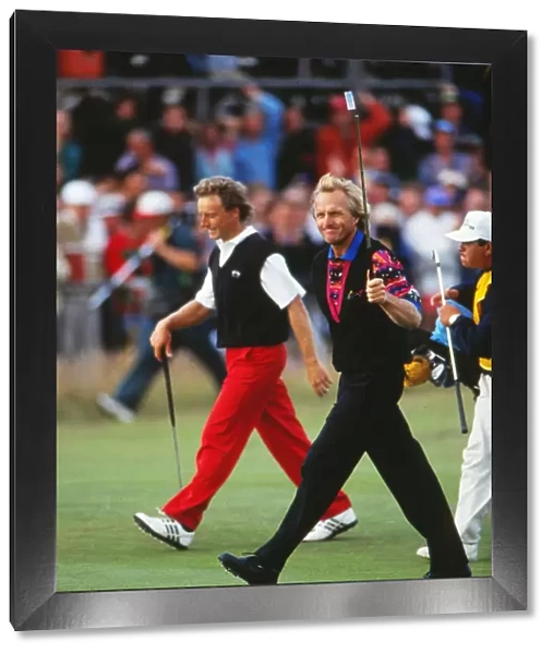 Greg Norman salutes the crowd on the final fairway at the 1993 Open Championship
