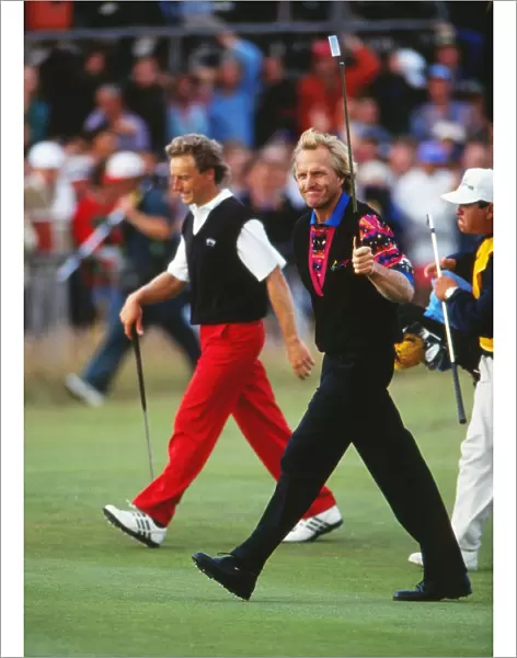 Greg Norman salutes the crowd on the final fairway at the 1993 Open Championship