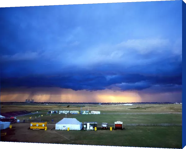 The sun bursts through the storm clouds at the 1985 Open Championship
