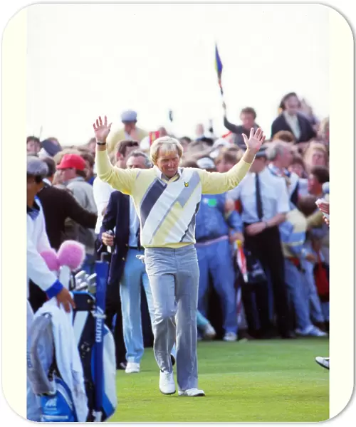 Greg Norman is applauded by the crowd at the final hole of his 1986 Open triumph