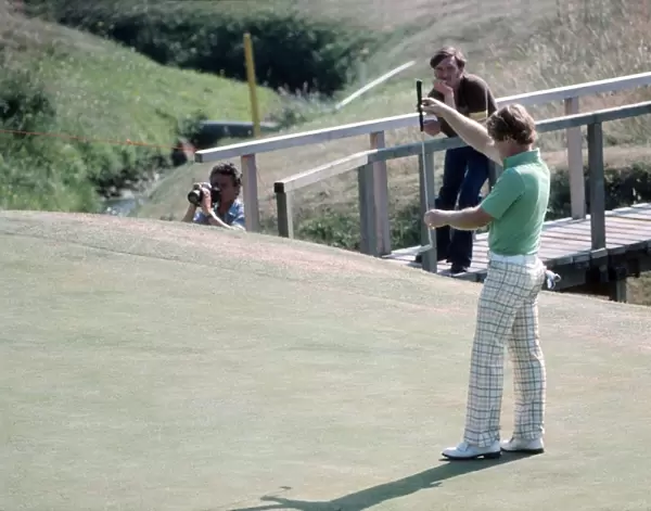 Tom Watson lines up a putt on the way to winning the 1977 Open