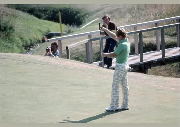 Tom Watson lines up a putt on the way to winning the 1977 Open