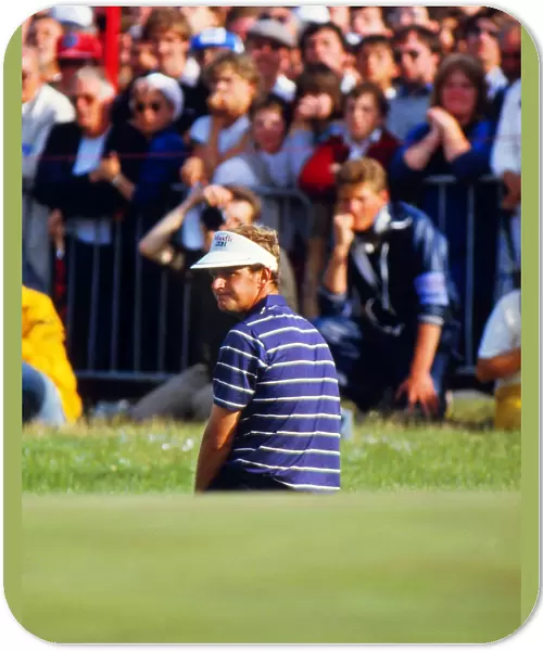Sandy Lyle falls to his knees after leaving his chip short on the final hole of the 1985 Open