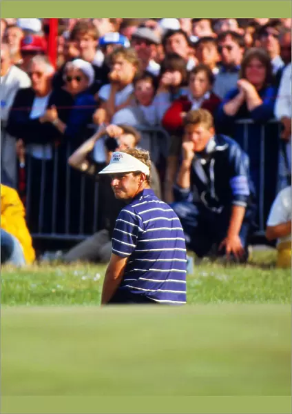 Sandy Lyle falls to his knees after leaving his chip short on the final hole of the 1985 Open