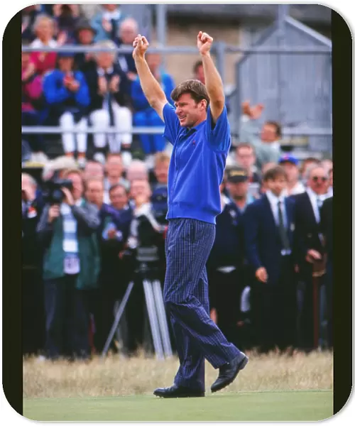 Nick Faldo raises his arms after winning the 1992 Open Championship