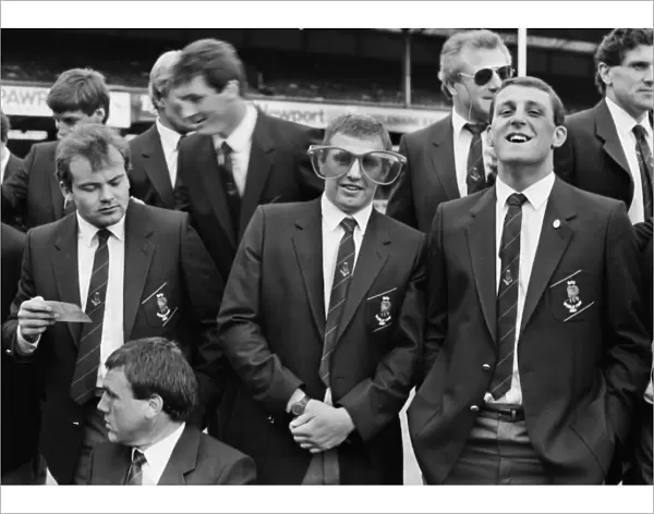 Dean Richards jokes around with a large pair of glasses with team mate Wade Dooley at Twickenham in 1987