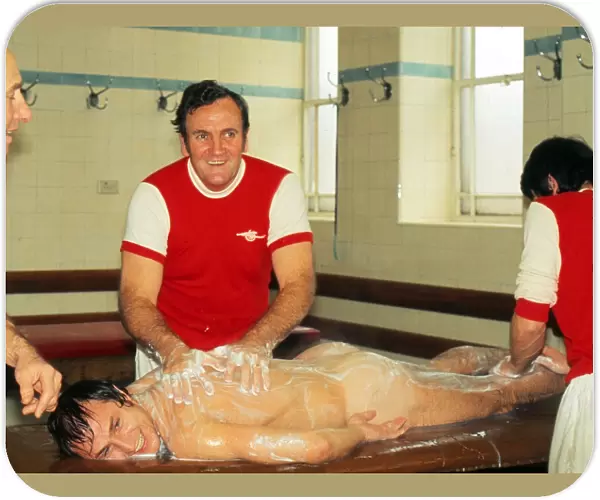 Don Revie - England manager - gives Dennis Tueart a body massage