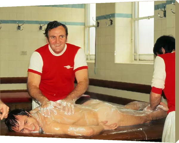 Don Revie - England manager - gives Dennis Tueart a body massage