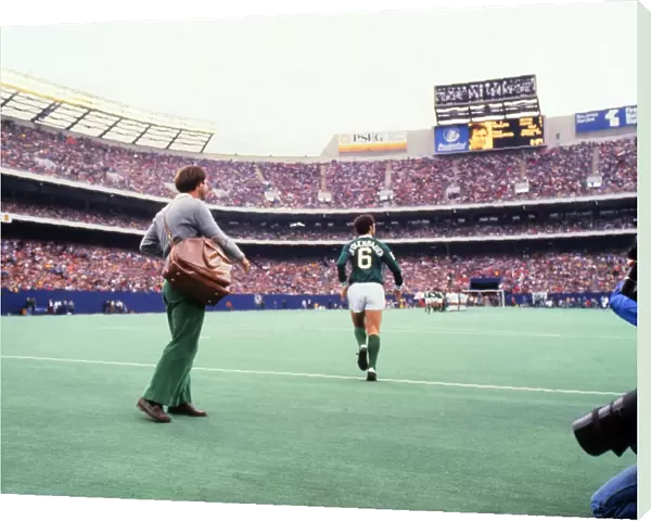 Franz Beckenbauer runs out at Giants Stadium for Peles farewell game