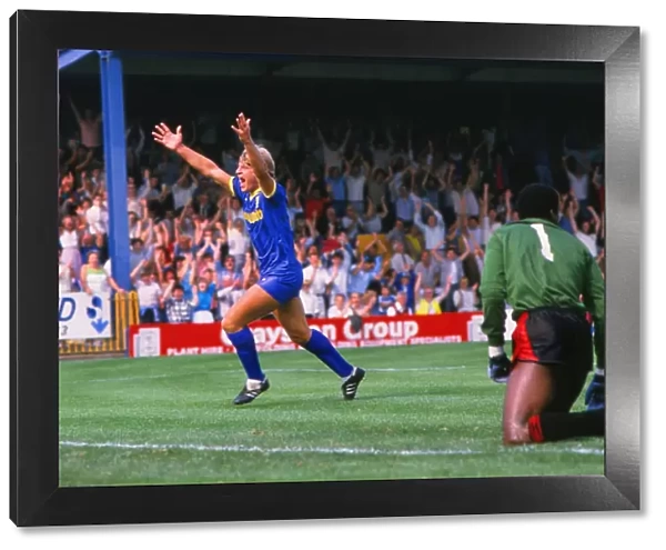 Glyn Hodges of Wimbledon celebrates scoring against Man City in 1984
