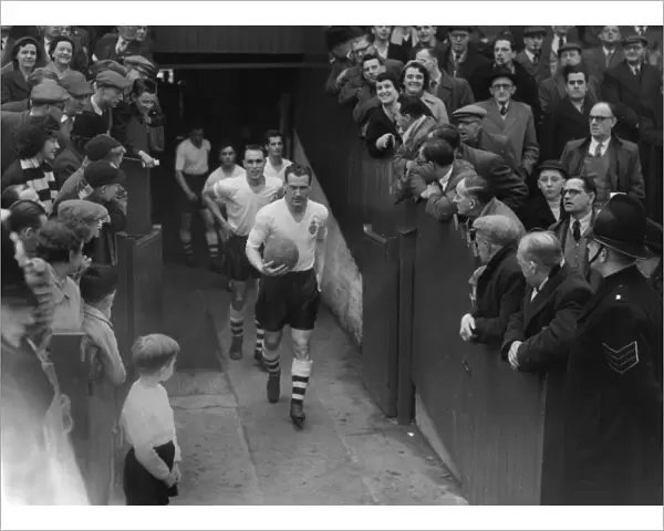 Nat Lofthouse leads Bolton out at Burnden Park in 1958