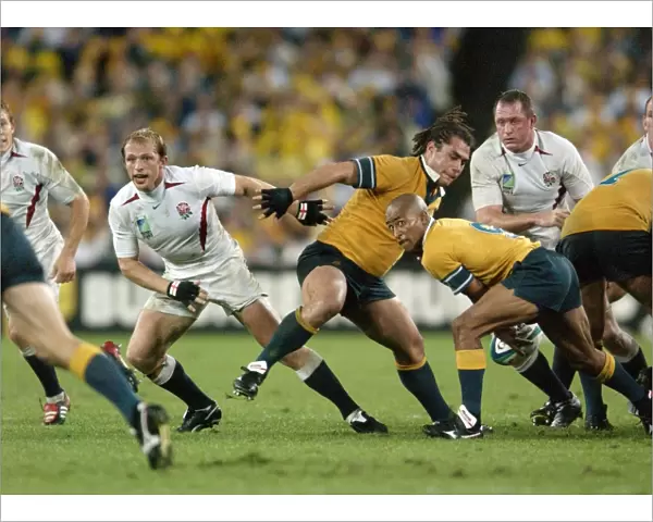 The two scrum halves in the 2003 World Cup final