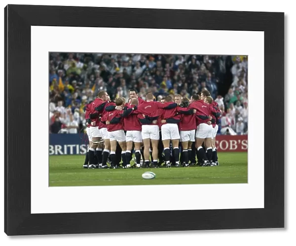 The England team huddle before the 2003 World Cup Final