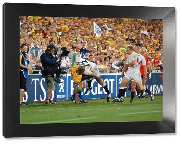 Mike Tindall dump tackles George Gregan off the field during the 2003 World Cup Final
