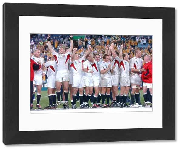 England players celebrate before receiving their World Cup winners medals