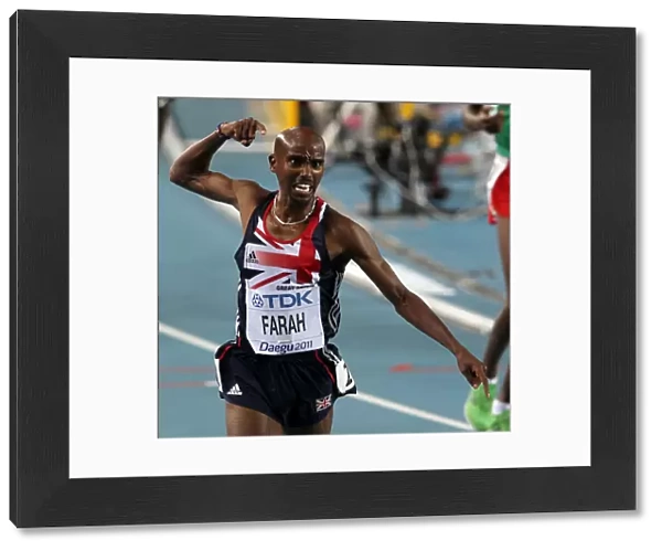 Mo Farah celebrates winning the 5000m final at the 2011 World Championships