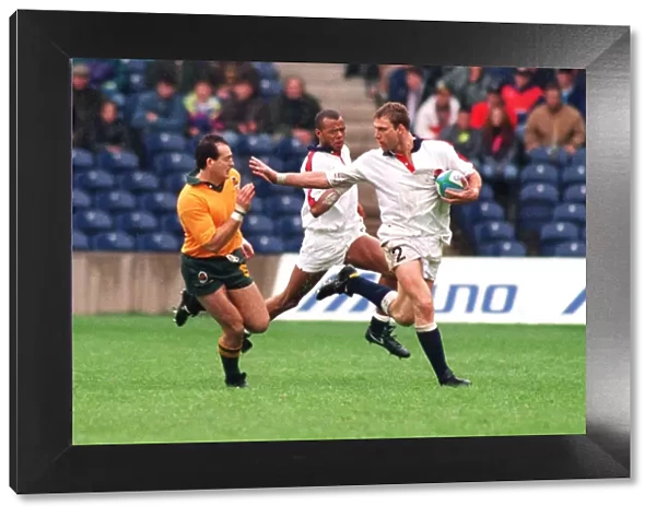 Lawrence Dallaglio hands off David Campese at the 1993 World Sevens