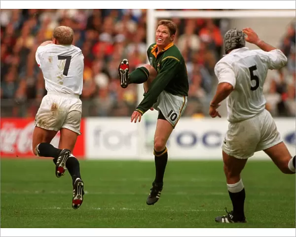 Jannie De Beer kicks one of his record five drop goals against England at the 1995 Rugby World Cup