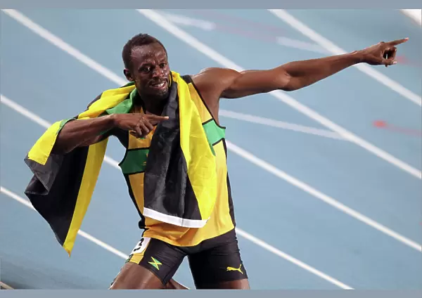 Usain Bolt celebrates his 200m gold medal
