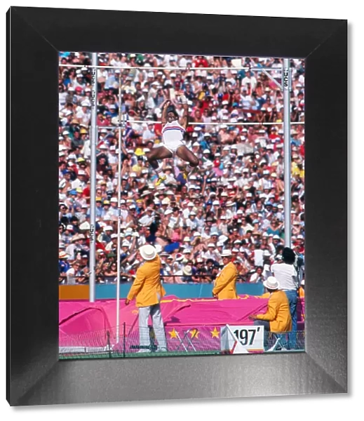 Daley Thompson soars over the bar during the decathlon pole vault at the 1984 Olympics